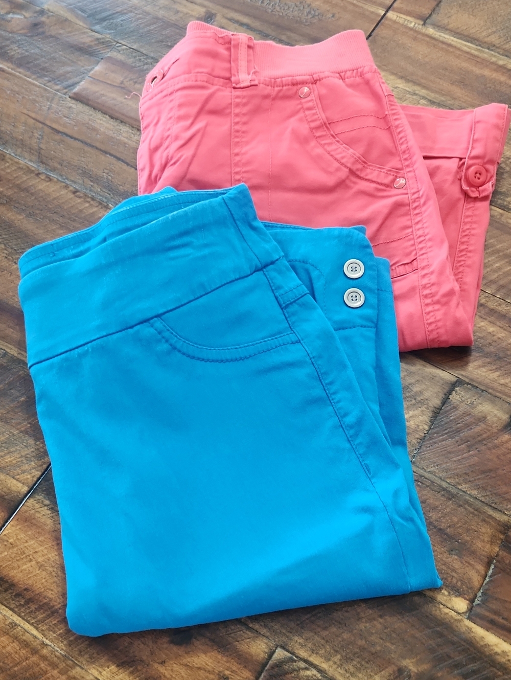 2 small womens shorts/capris in blue and coral.